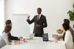 Confident Business Coach Giving Presentation