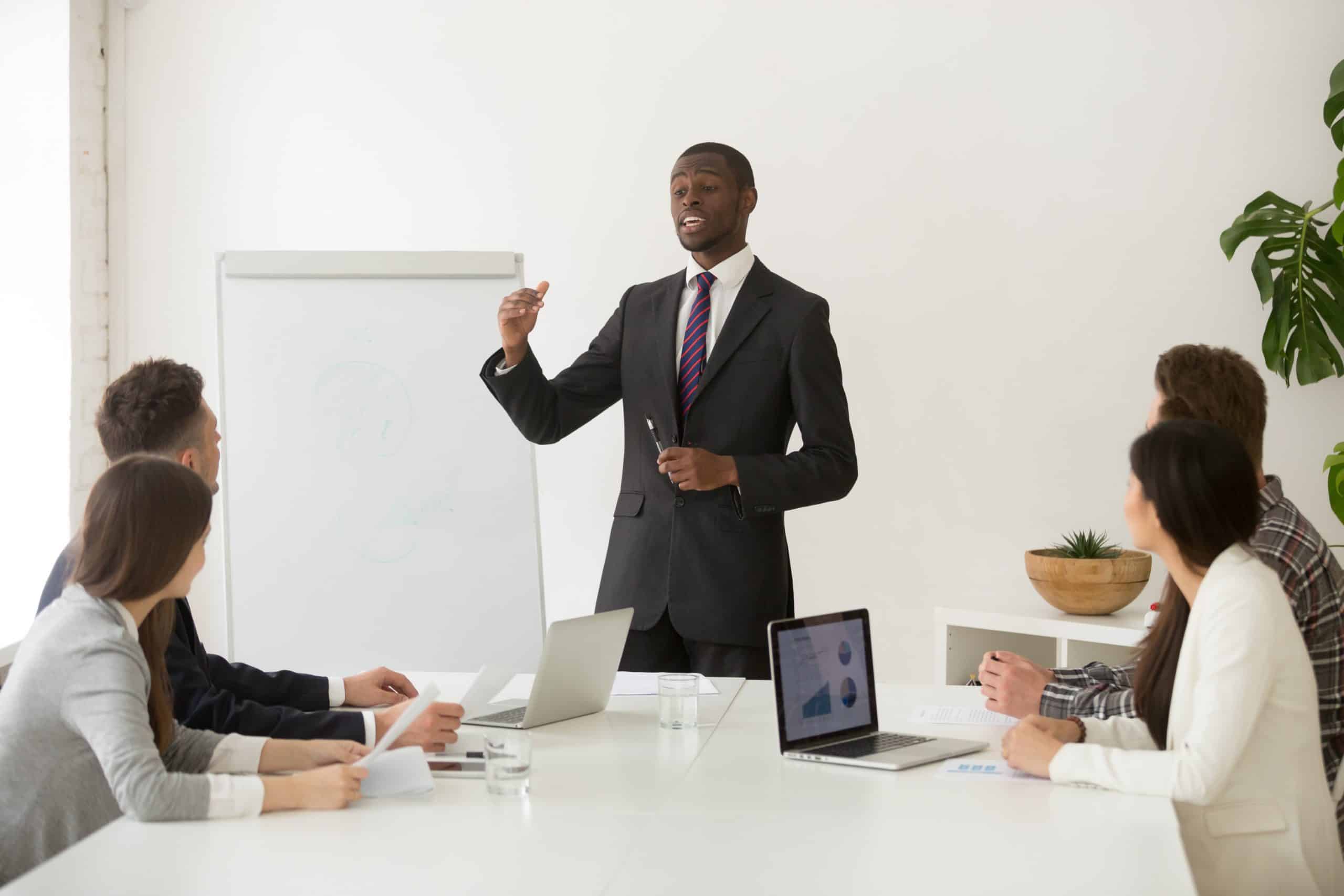 Confident Business Coach Giving Presentation